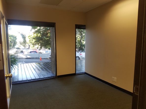 PLAZA LEVEL, FRONT OF BUILDING, NORTH WEST CORNER